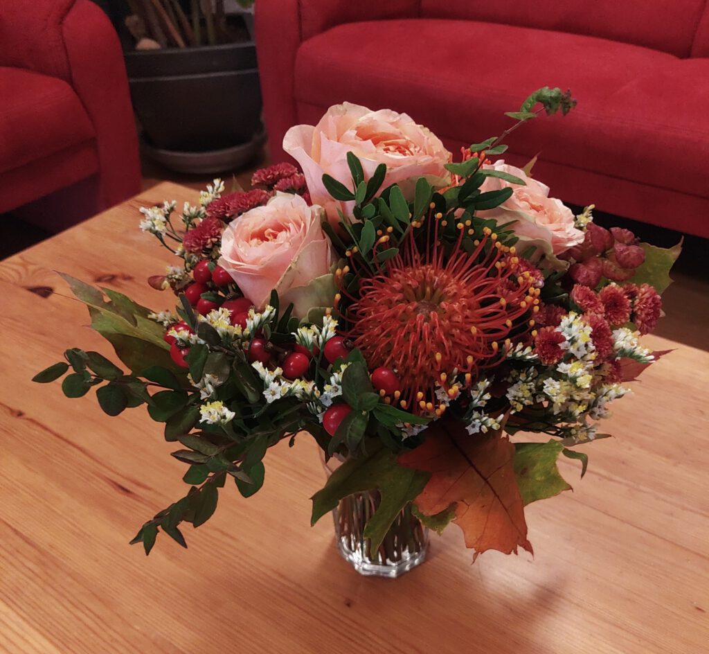 2025-10-16 Vortrag Uelzen DANKE Blumenstrauß aus Uelzen als Dankeschön